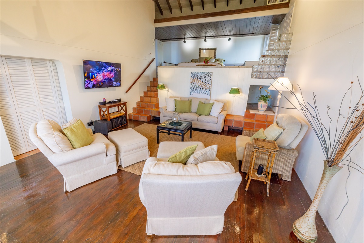 Guest Suite 1 living room gives you space to relax in private when desired