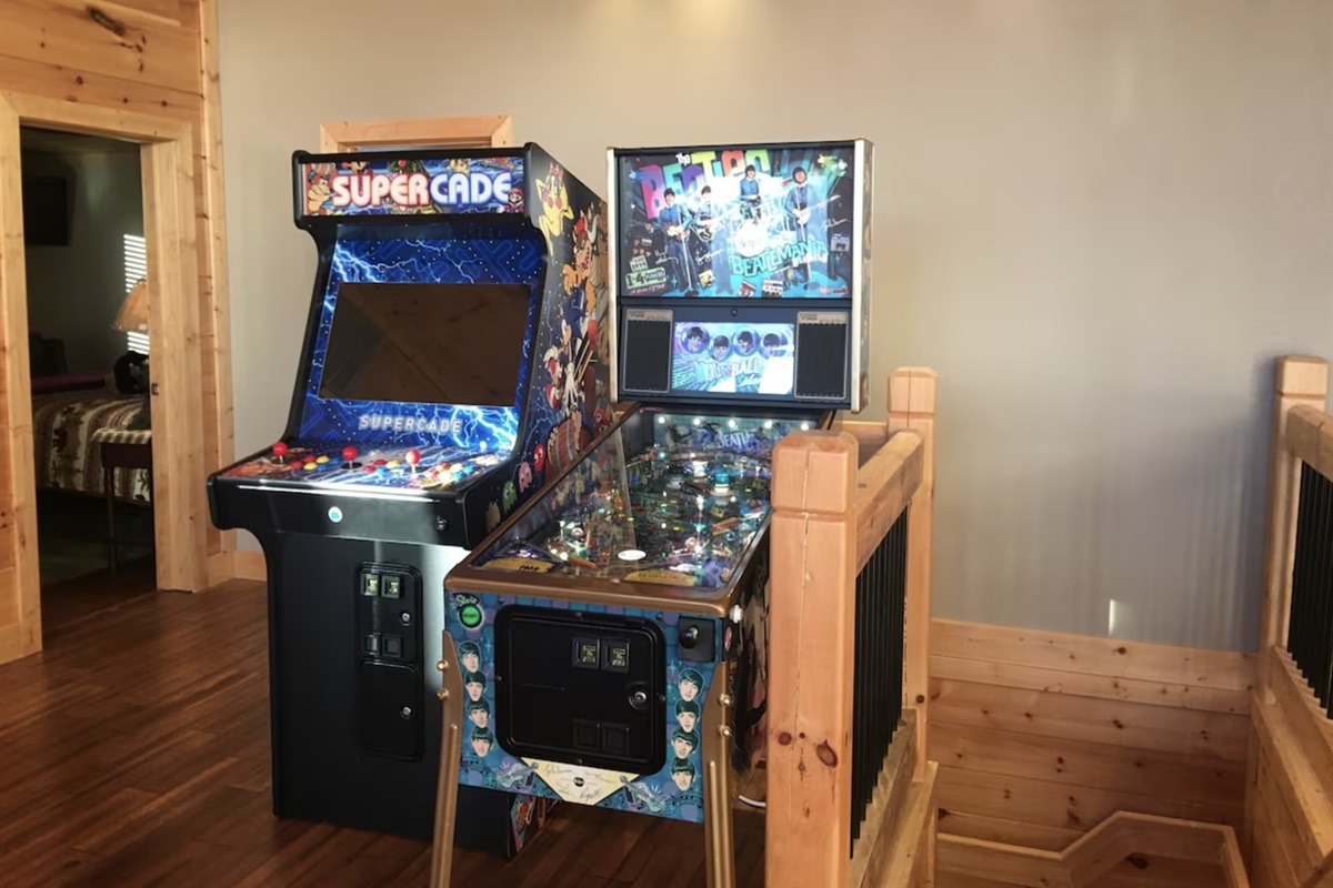 The loft on the second floor has an arcade machine fit with hundreds of classic arcade games, and a retro Beatles pinball machine!