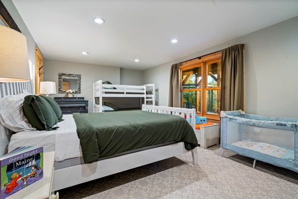 Spacious basement bedroom with room for everyone.
