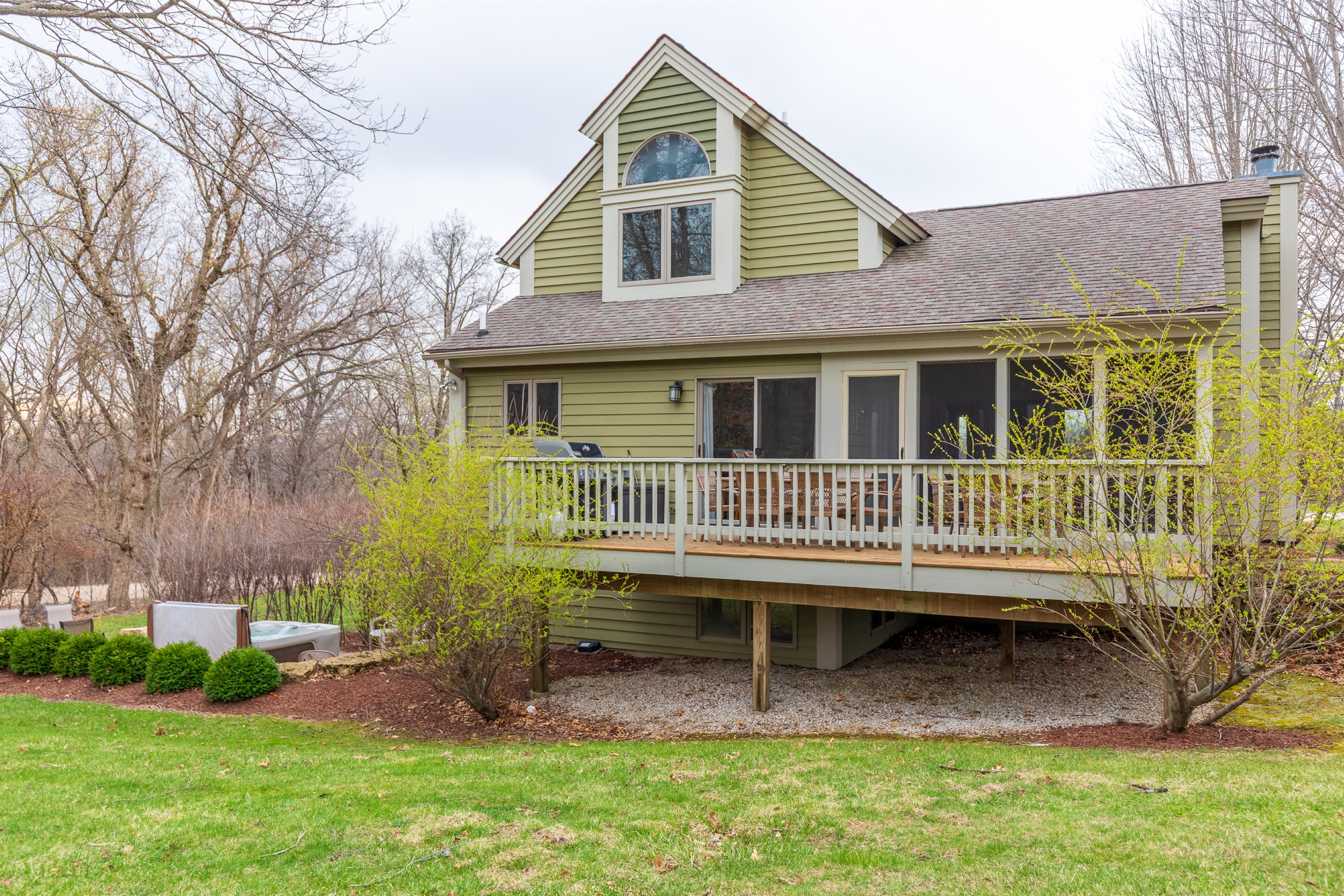 Enjoy the large deck overlooking the back yard and the North Golf course