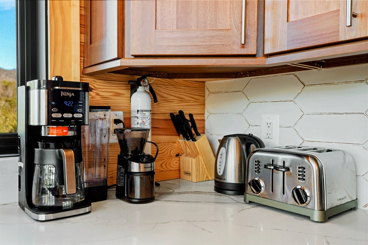 Morning Essentials – Start your day right with a fully stocked coffee station, blender, toaster, and more.