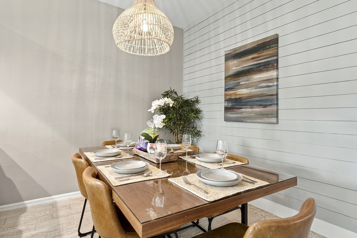 Dining area with plush chairs and stylish place settings for shared meals