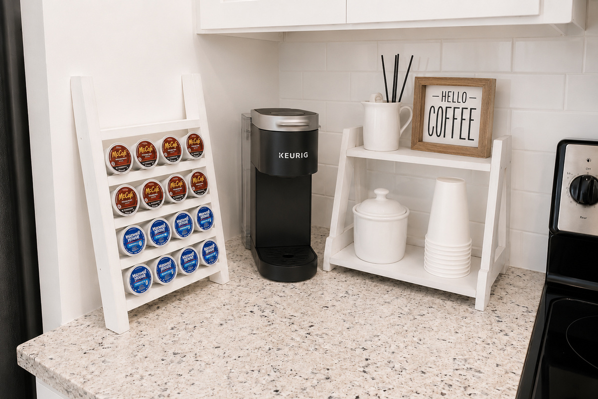 First one up starts the Keurig — the coffee corner comes stocked with pods, cocoa packets for the kids, and a HELLO COFFEE sign that makes the morning ritual official. Sunrise over Vilano pairs beautifully with it.