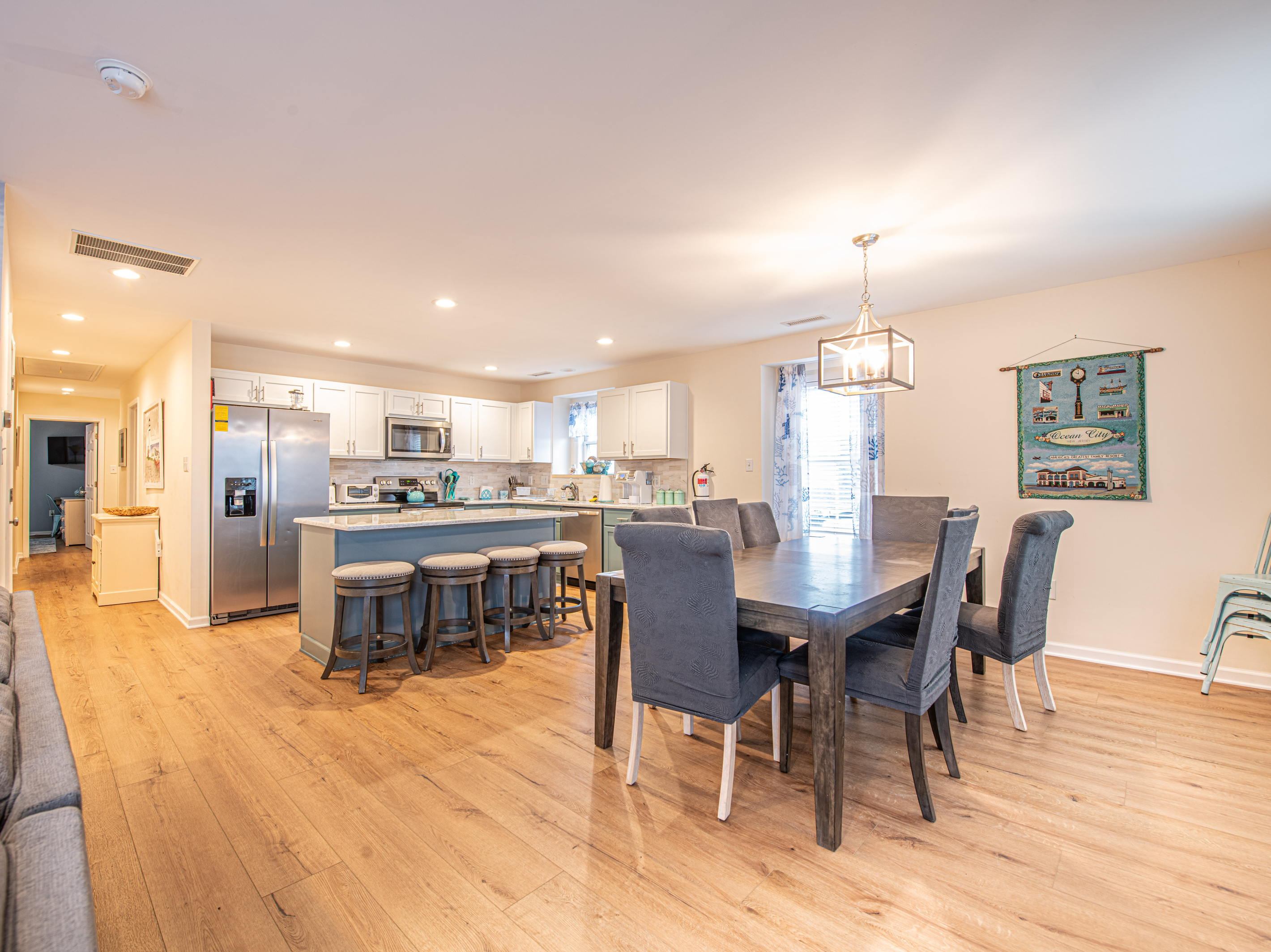 Open-Concept Living and Dining Space Showing Kitchen and Table Setup