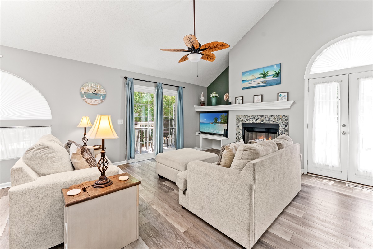 Lovely large living room area with fireplace
