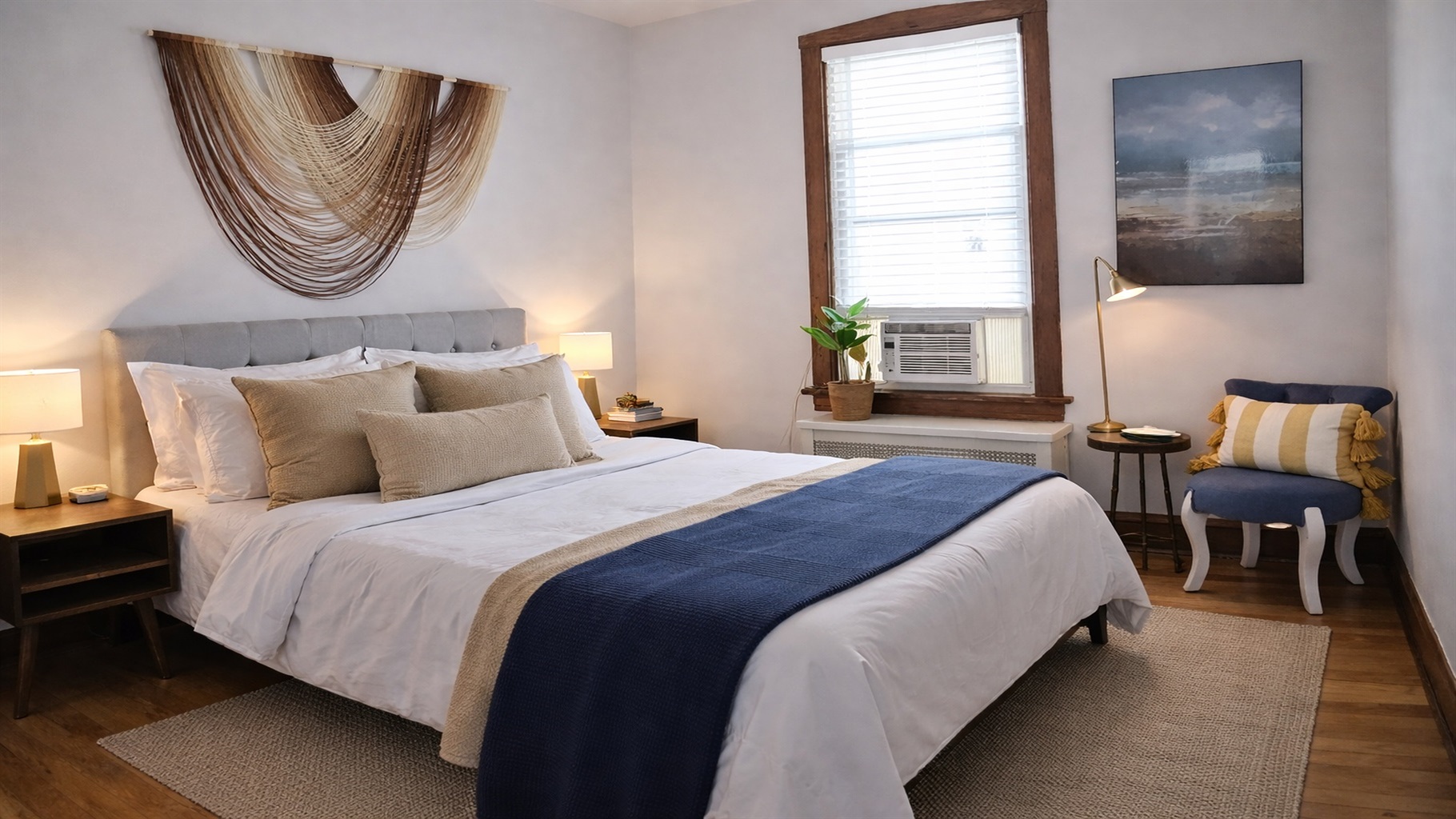 Calm, hotel-quality sleep with plush bedding, privacy and warm hardwood charm. 