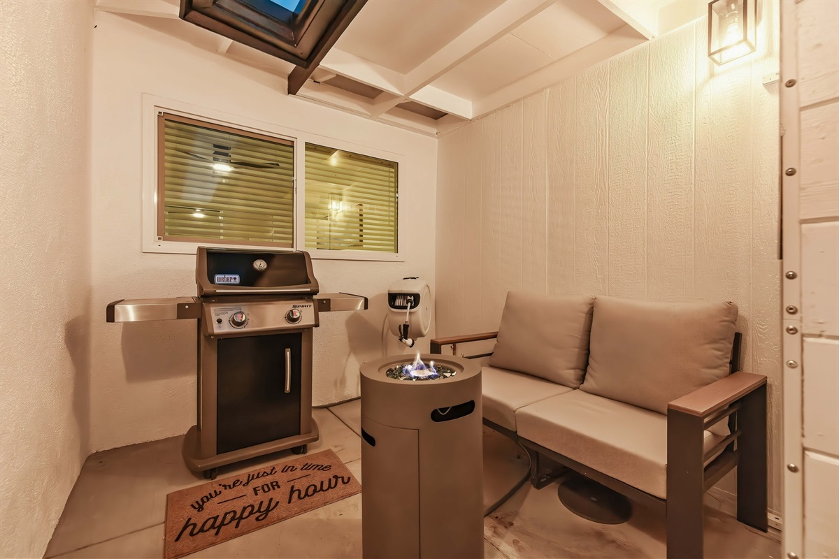Master Bedroom side patio with bbq, seating and fire table