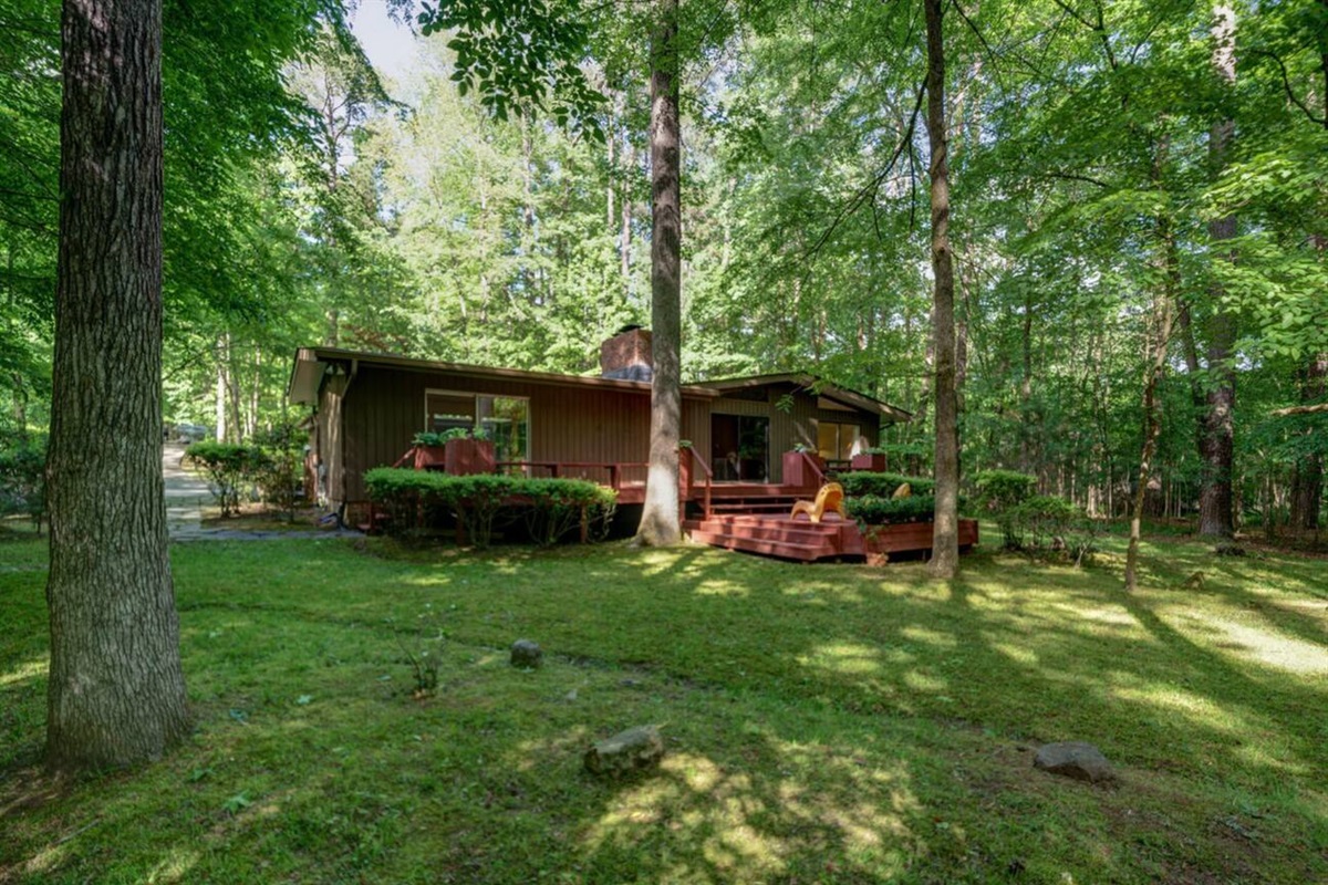 The home sits on an acre and has a peaceful and private backyard.