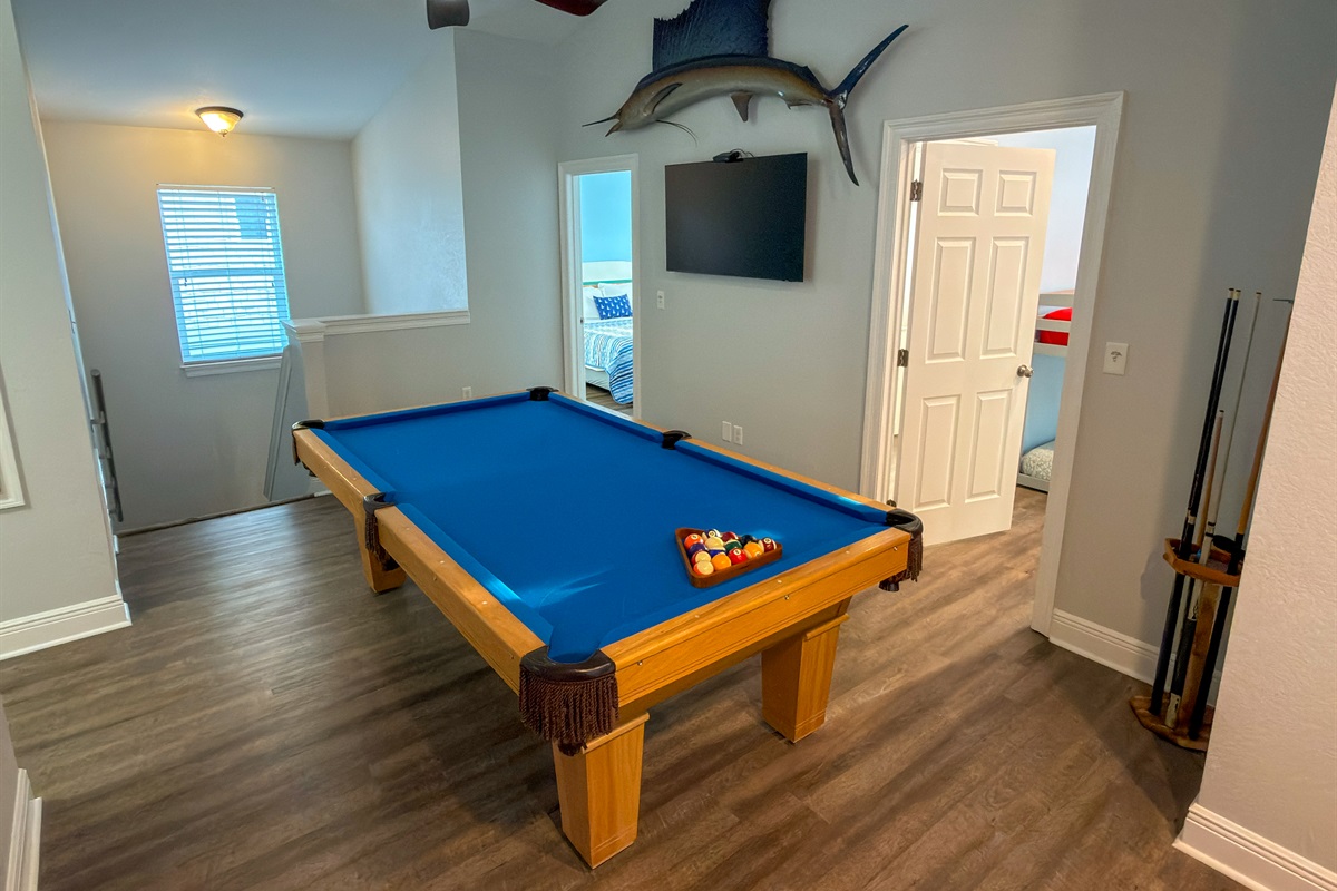 From late-night pool games to afternoon breaks from the sun, the upstairs entertainment space is made for spending time together.