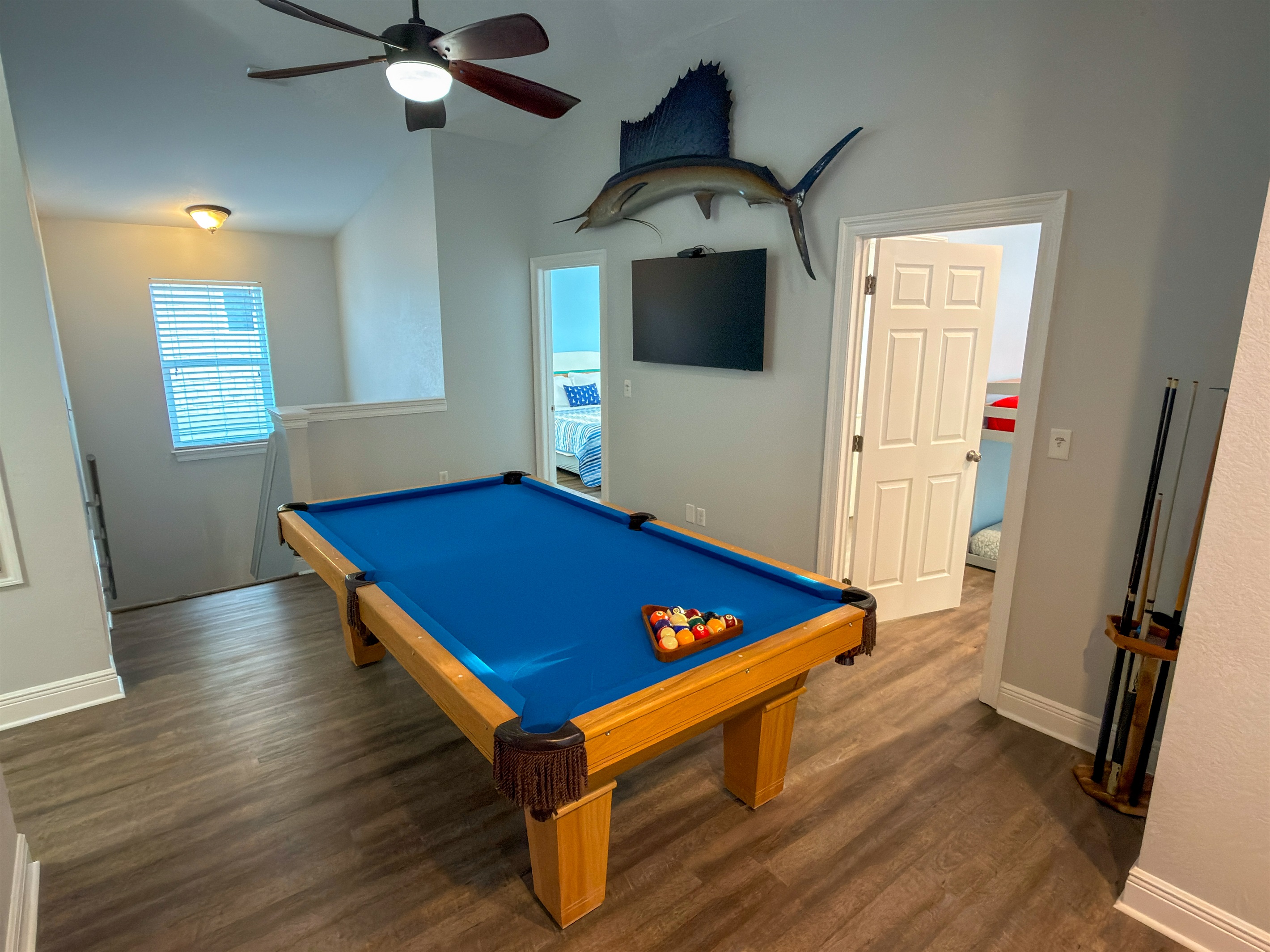 From late-night pool games to afternoon breaks from the sun, the upstairs entertainment space is made for spending time together.