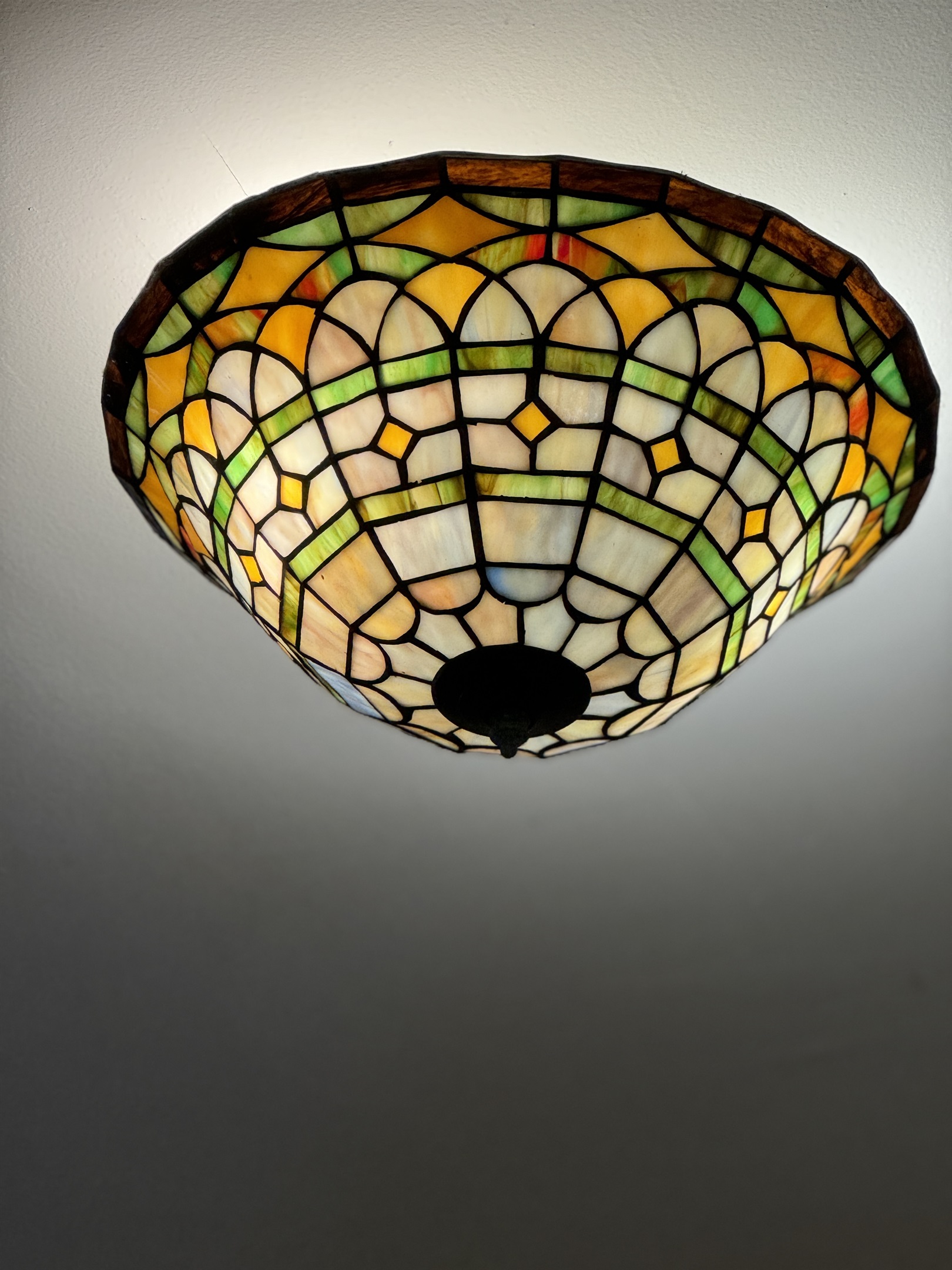 Tiffany-style ceiling light in center hallway