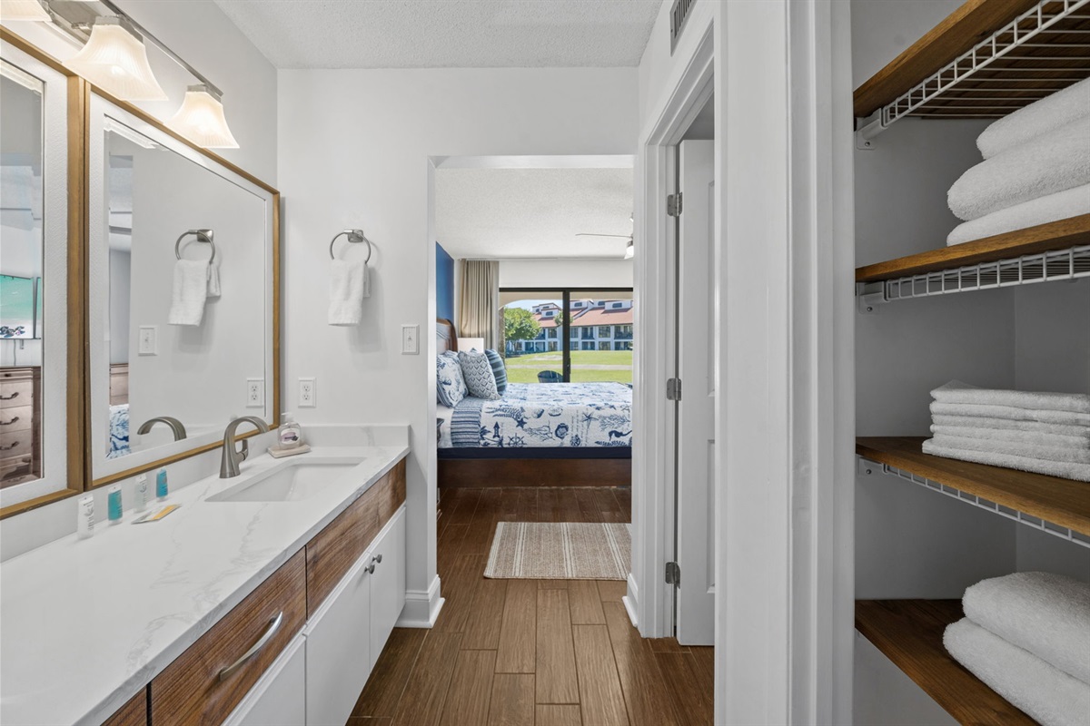Linen closet stocked with bath, hand towels and washcloths