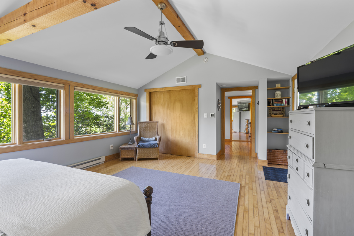 Spacious primary bedroom in far end of the house