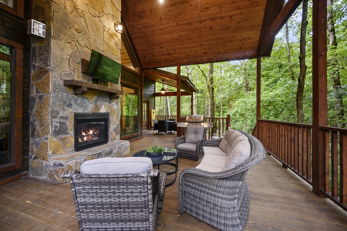 The elevated deck and towering pines make you feel tucked into the forest.