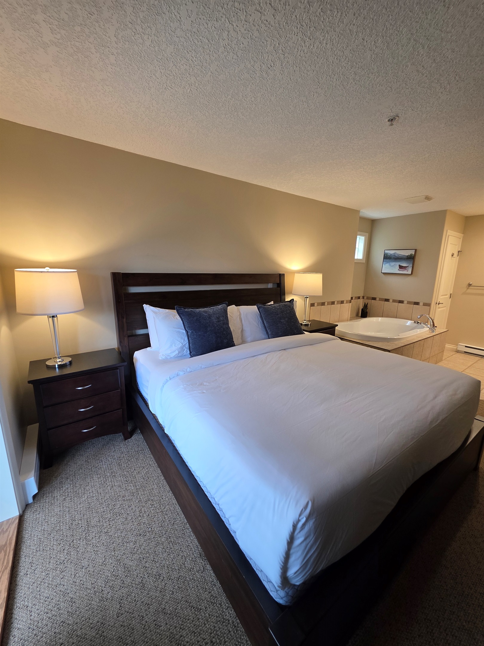 Unit A. King Bed. Soaker Tub right in room. Streaming TV in room as well.