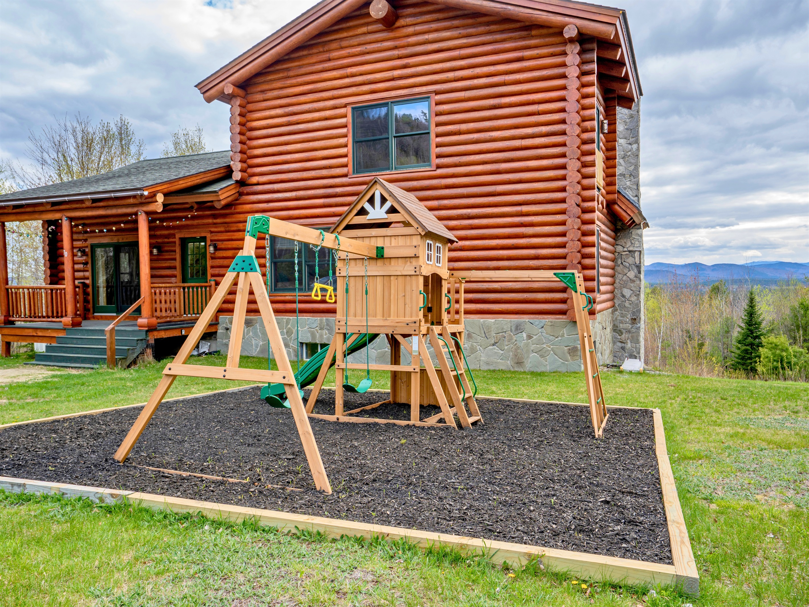 Take in the peaceful woodland setting while the kids enjoy the playground just steps away from the cabin