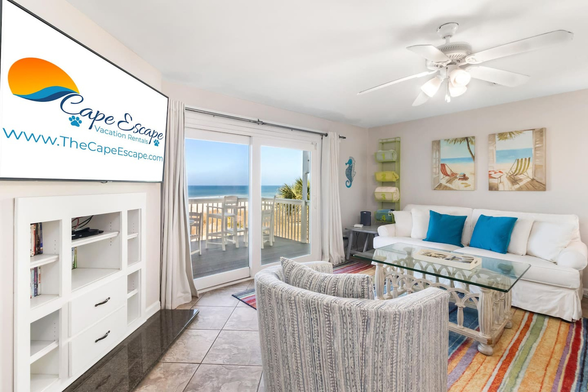 Settle into the living room and let the Gulf view through the windows set the tone &mdash; this is where the trip actually begins.