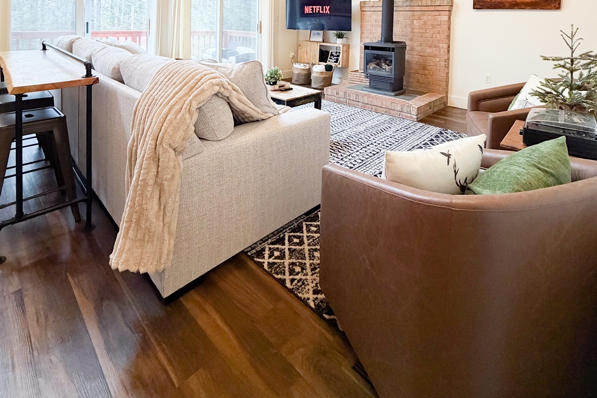 Cozy up near the fire while watching a movie.