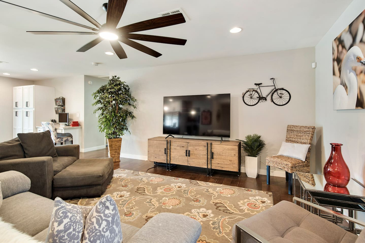 Large family room, cool fan breeze, and a big TV.