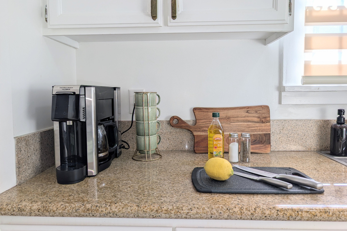 Fully equipped kitchen with coffee maker and everything you need for home-cooked meals.