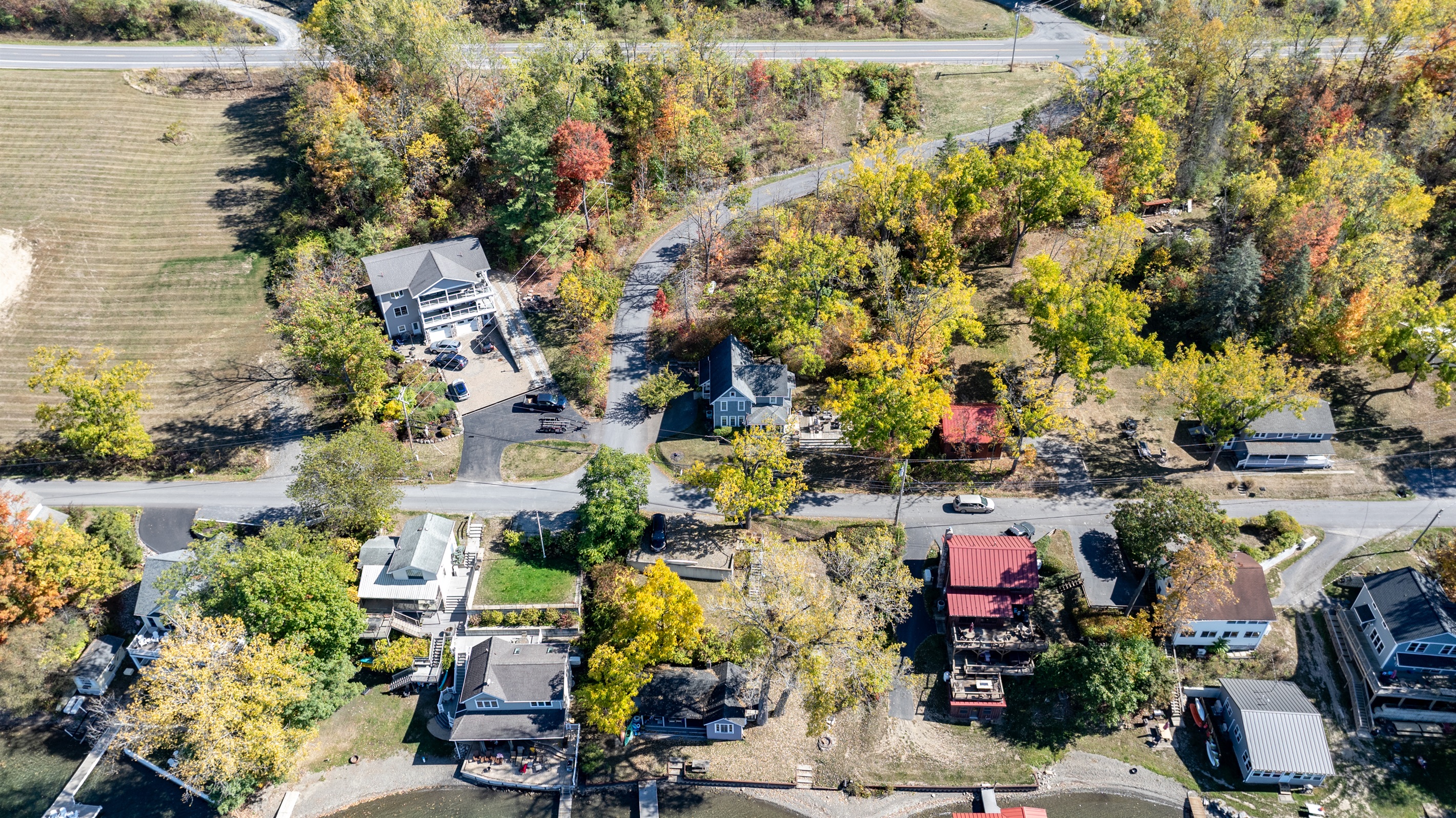 Nestled among colorful fall trees, this peaceful lake community offers the perfect mix of nature and charm