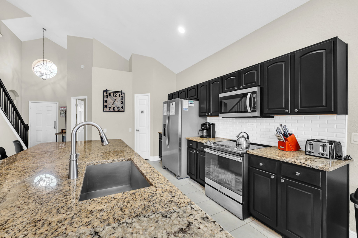 Stove, Oven, Refrigerator/Freezer, Microwave, And Coffee Maker - All Supplied For Your Use