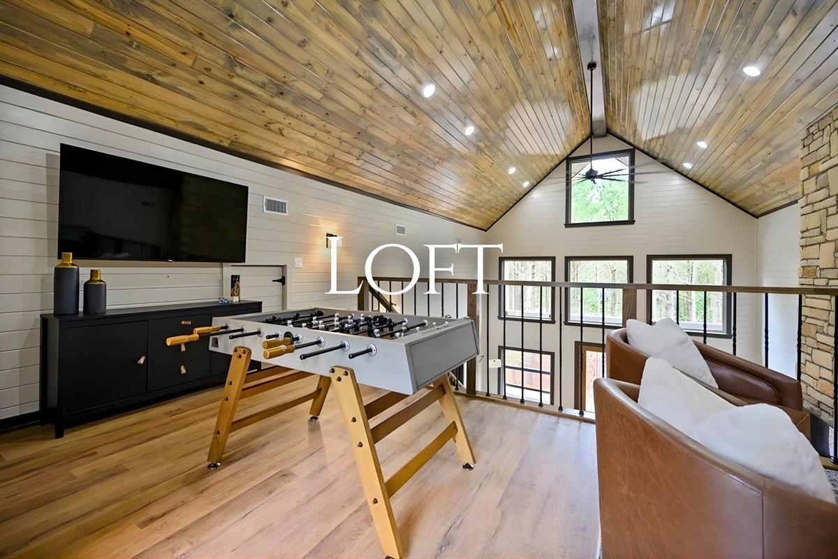 Up in the loft, you’ll find an additional living space that’s perfect for lounging, reading, or letting kids hang out.