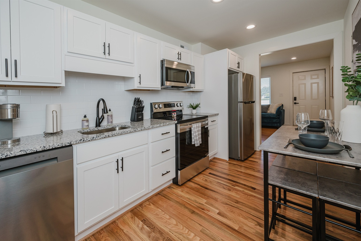 Unit E also has its own full sized kitchen with dining options for four.