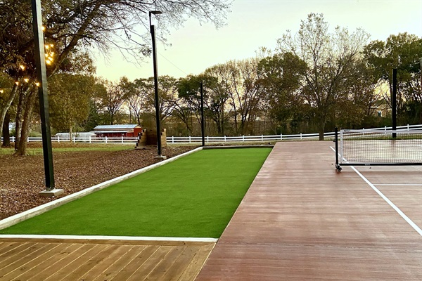 Game courts with Bocce, pickle ball, basketball