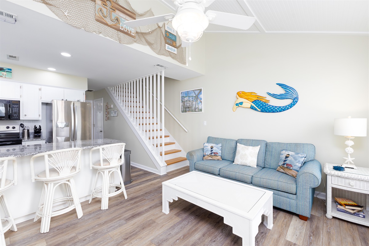 Light and bright living area with cozy seating