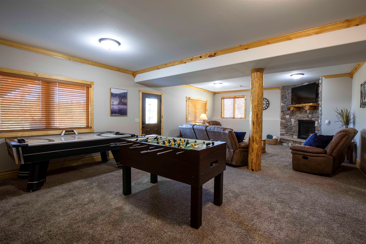 The large and inviting lower living room is the perfect place to unwind and gather after a long day.