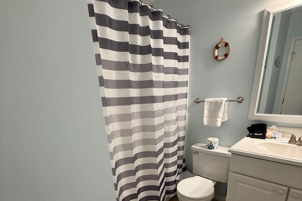 Bathroom with tub and shower