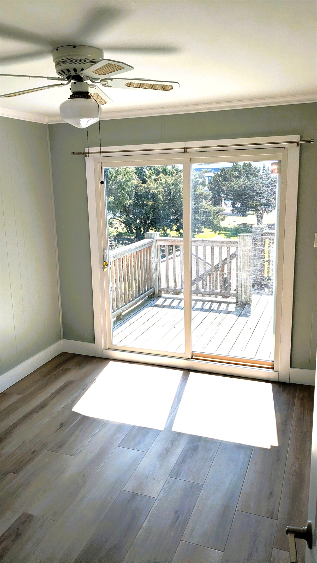 Great natural light coming in to the queen bedroom in the back.
