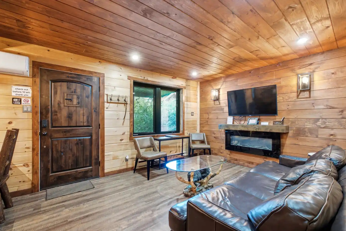 Comfortable living room with fireplace and wall-mounted TV