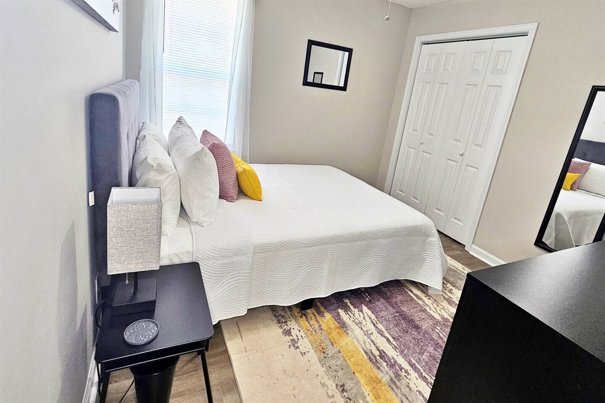 Full-length mirror & closet space.