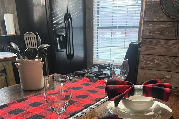 The table is beautifully set, perfectly ready to celebrate the holiday season.