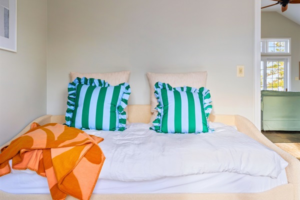 A versatile space with a sleeper sofa, ideal for relaxing or hosting guests on the main floor.