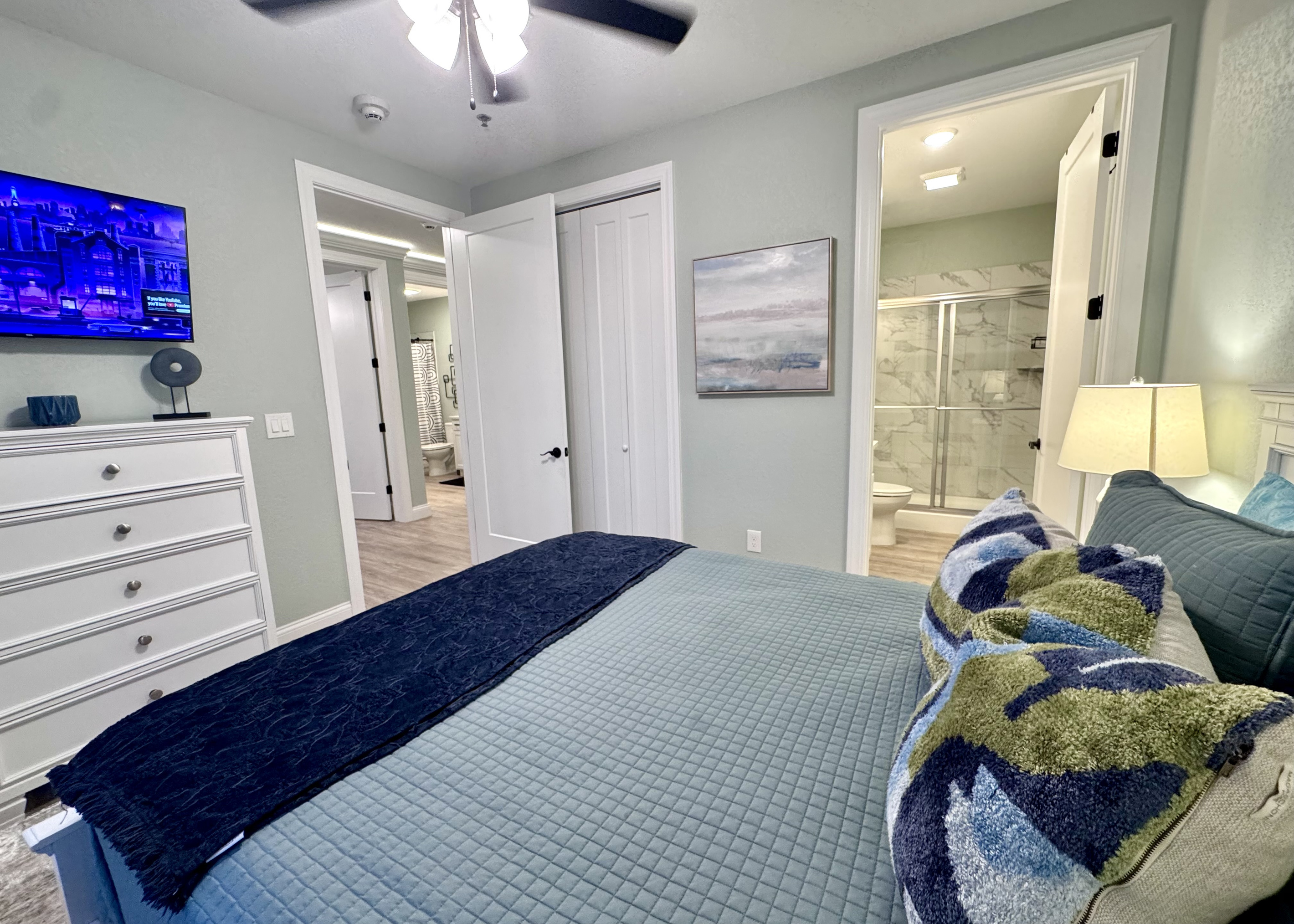 Queen bed, Roku TV, dresser, nightstands, lamps, closet, and all linens and bedding included