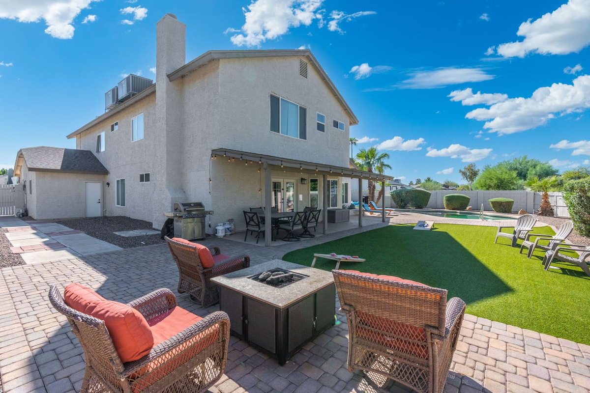 Fire pit season, every season — cozy seating just steps from the pool.