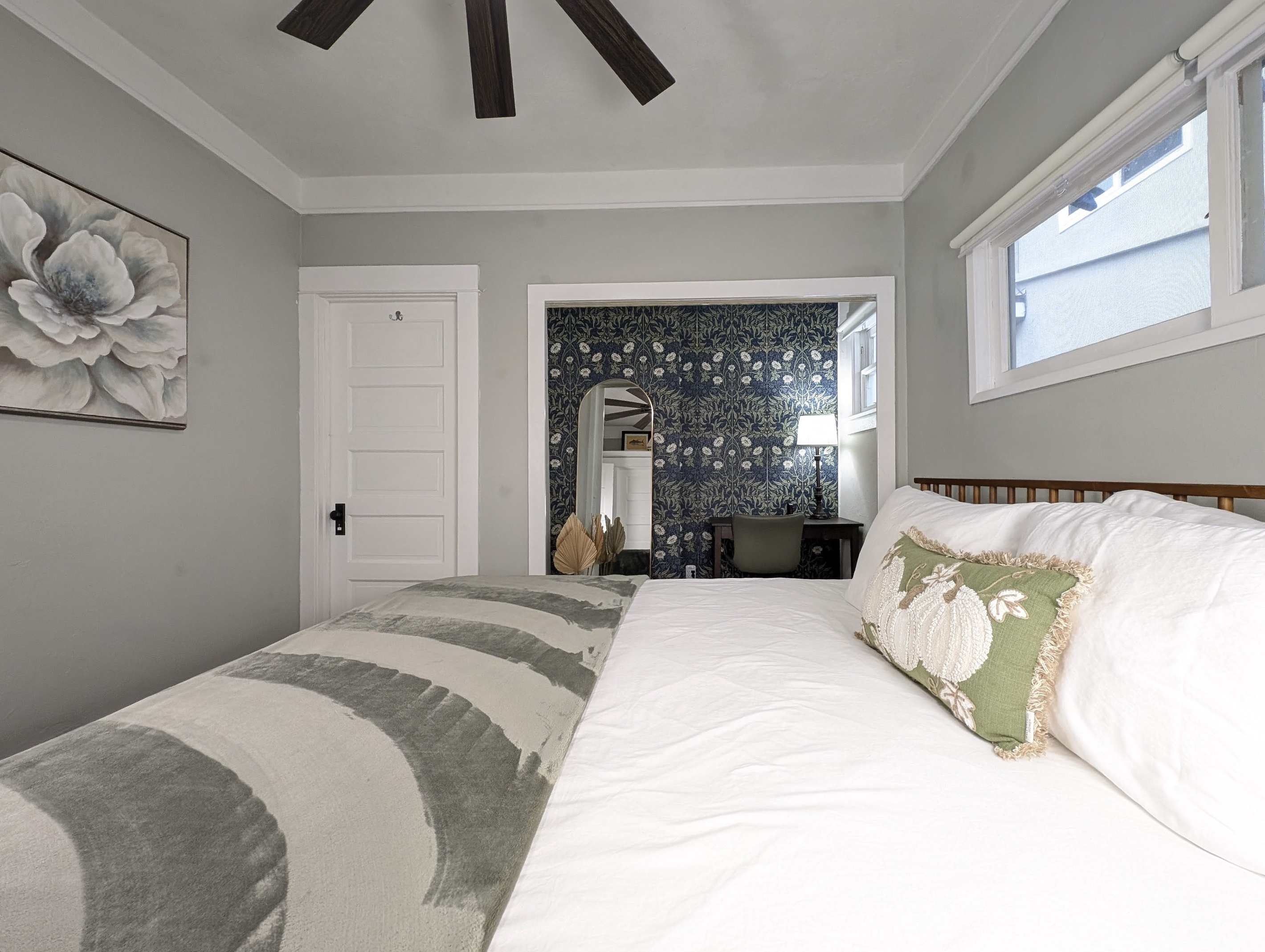 Wake up refreshed in a peaceful bedroom featuring a comfortable bed.