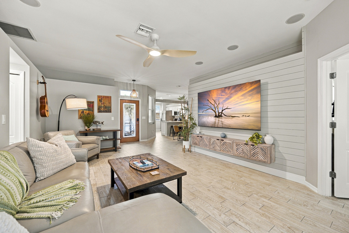 Relaxed coastal décor and comfy seating to instantly shift into vacation mode