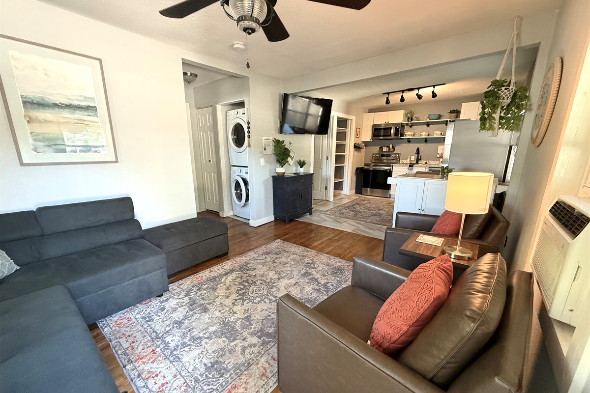 Apartment with full kitchen and washer/dryer.