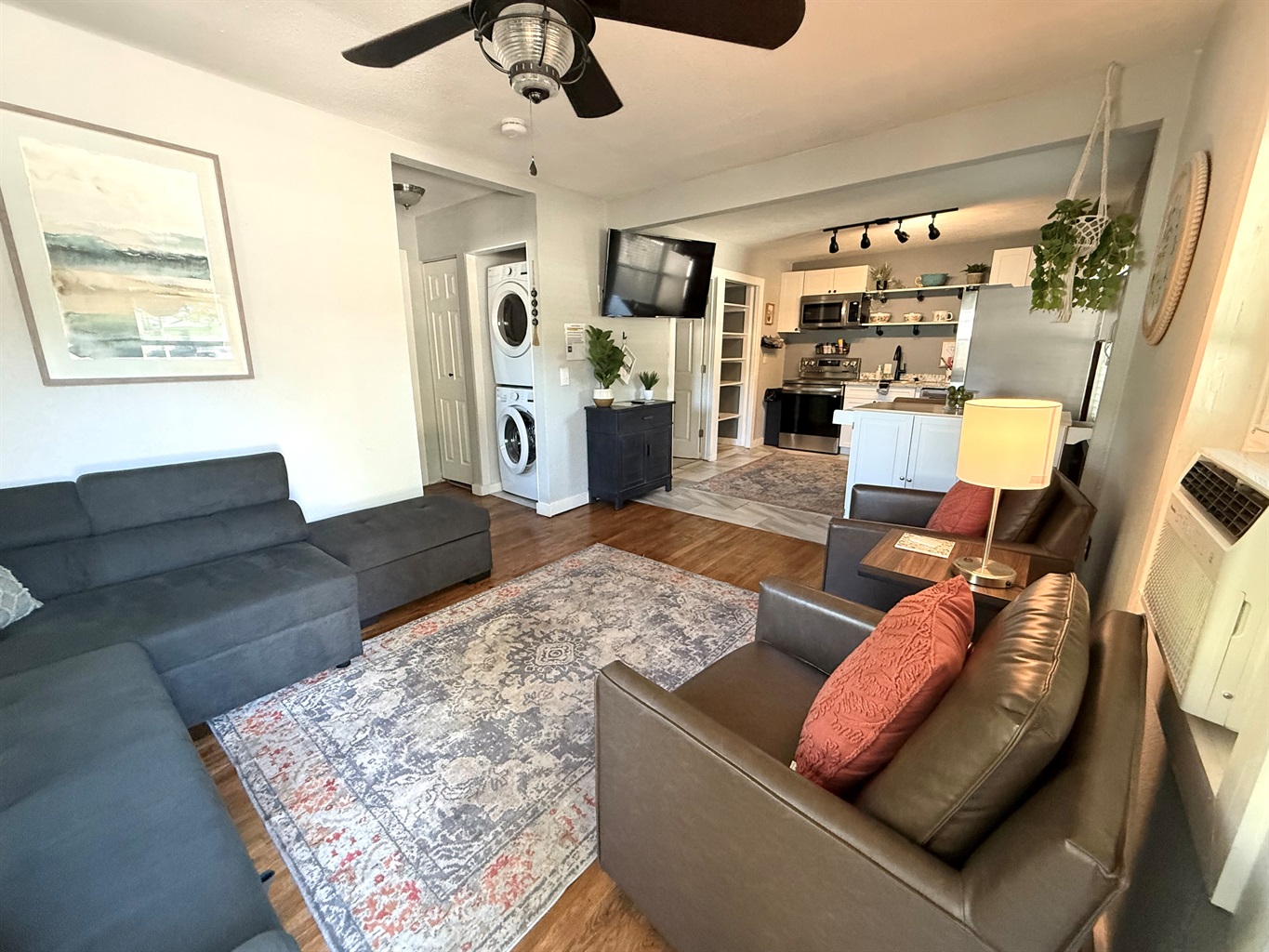 Apartment with full kitchen and washer/dryer.