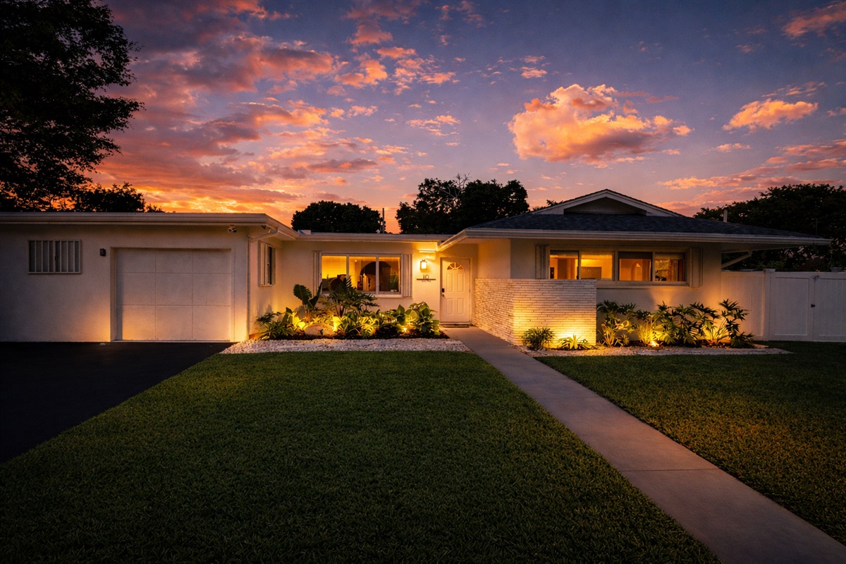 Golden-hour glow highlights this beautifully lit Palm Beach retreat—private, serene, and welcoming from the moment you arrive.