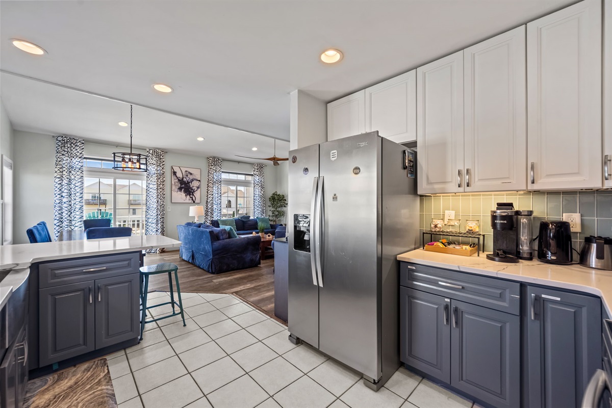 Open kitchen design flows seamlessly into the dining and living areas, letting you cook, chat, and stay connected with your family all day.