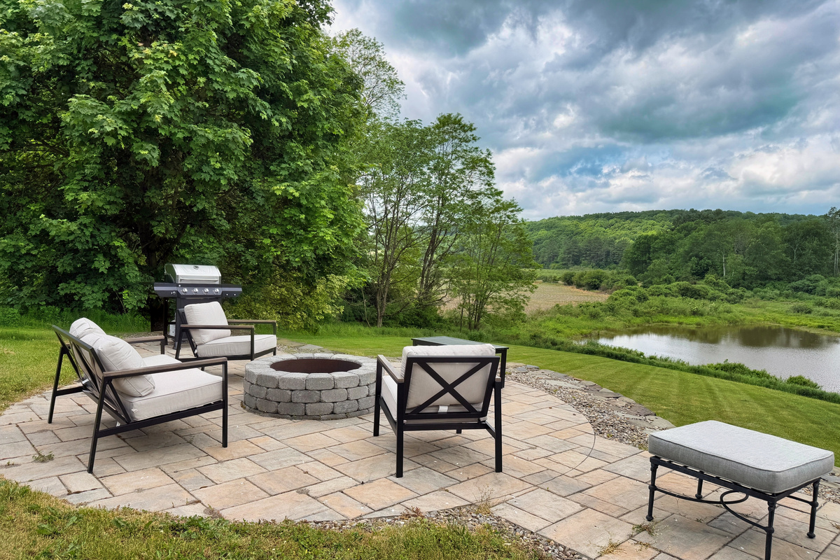 Outside seating around the wood burning fire pit