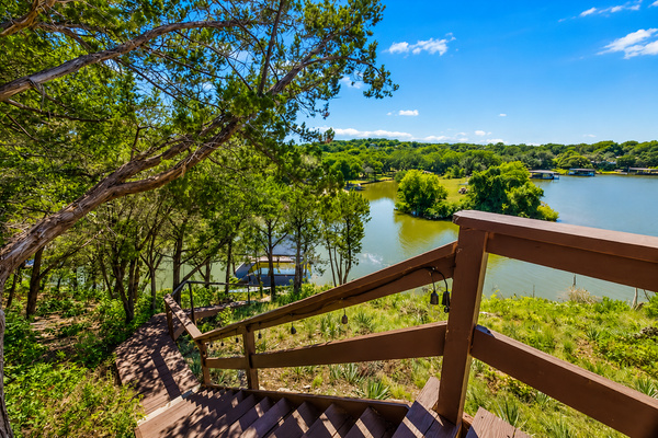 Private stairs leading from the home to the lake and dock.