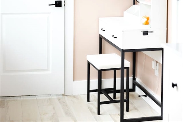 View looking toward doorway of bedroom #4 from shared toilet / shower area of bedroom #5.