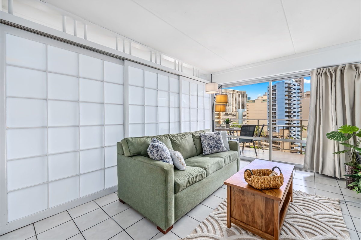 Living area off main bedroom area with shoji style sliding doors used to separate space and provide privacy 