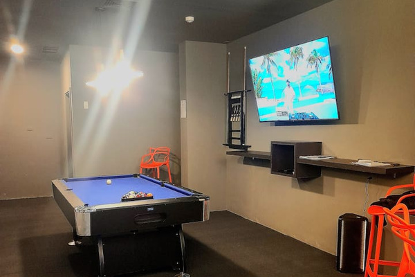 Take your pick—whether it's foosball or pool, this room guarantees hours of entertainment.